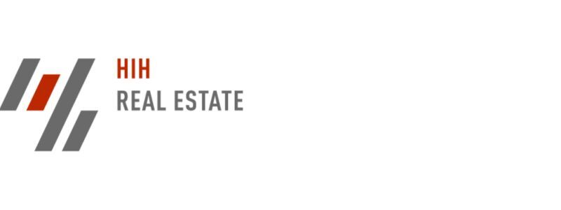HIH Real Estate Logo als Referenzkunde der 1000hands AG.